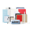 Cricut cutting machine with assorted colored paper packs mats rulers and craft tools on a white background