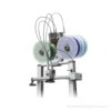 3D printer extrusion head mounted on a stand with multiple filament reels green blue and purple feeding into the nozzle against a white background