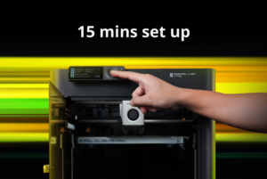 Hand adjusting a Bambu Lab 3D printers control knob during a 15minute setup