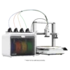 3D printer with a spool of rainbow filament and an external robotic arm setup for advanced printing