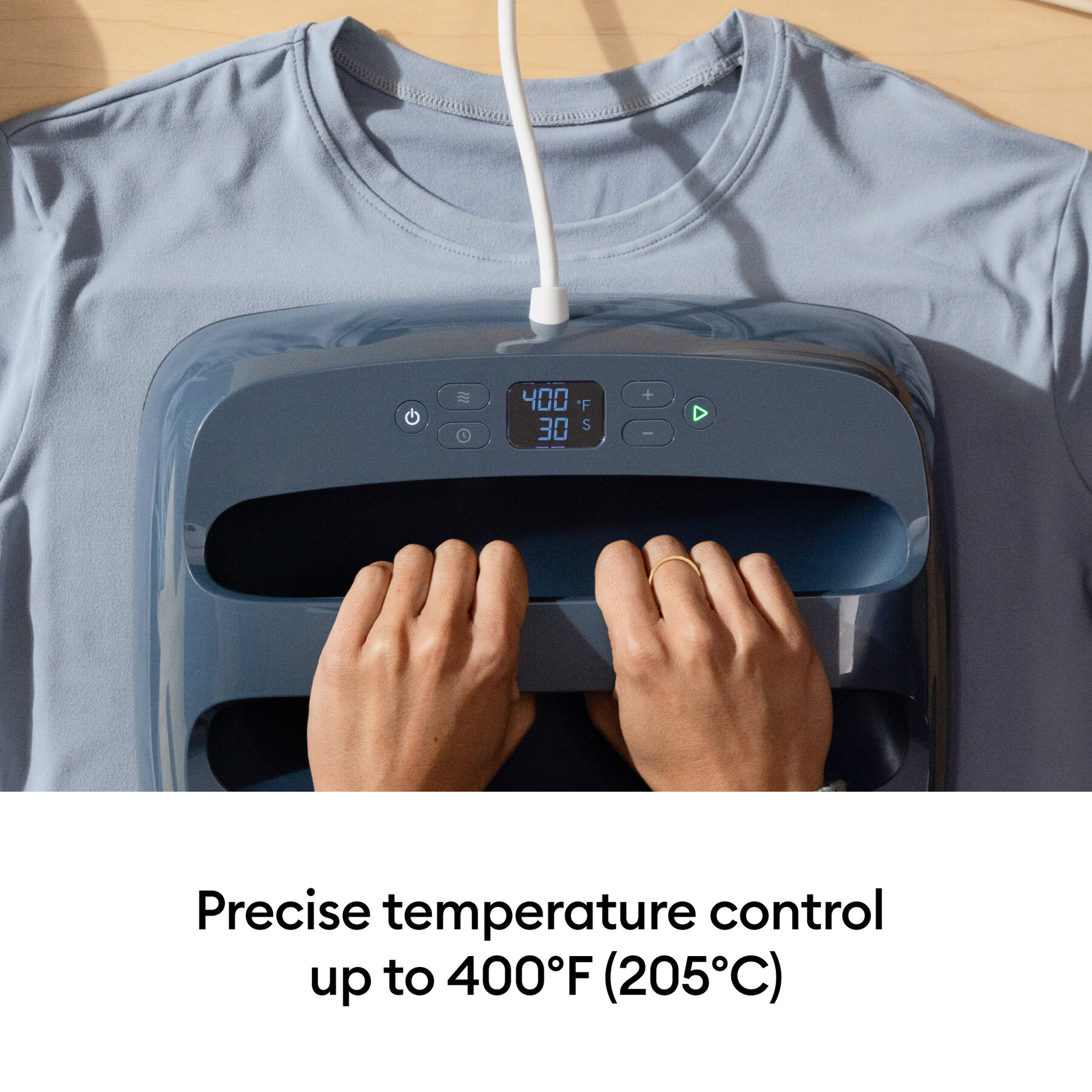 042012729infographic | Avloon Hands on a heat press machine pressing a light blue shirt display shows 400°F and 30 seconds connected by a power cord