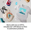 Floating craft flat lay white T shirt with turquoise mountain graphic rainbow tote scissors and other supplies for iron on transfer products promo