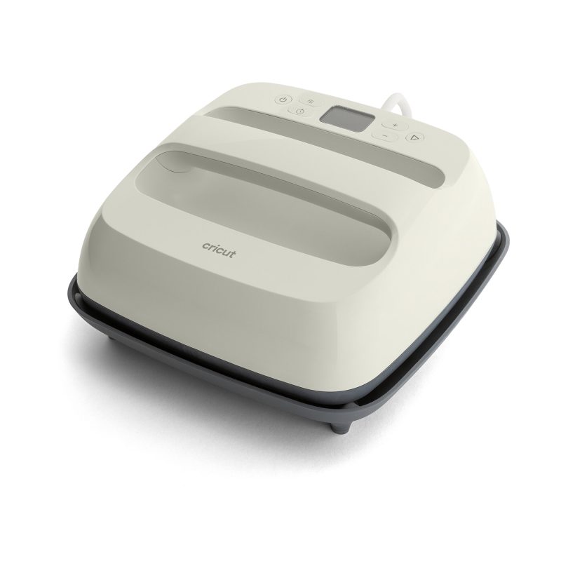 Top view of a white Cricut cutting machine showing the control panel with buttons and small display